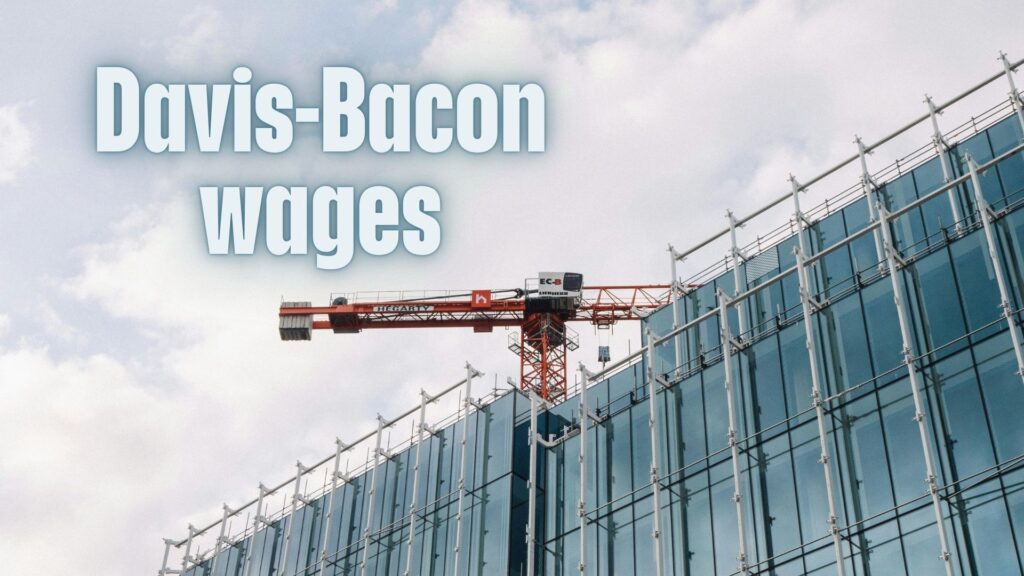Contractor reviewing Davis-Bacon wage rates and compliance checklist for 2025 federal projects.